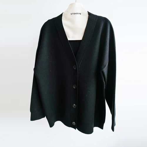 Jersei de cardigan de llana negre per a dona